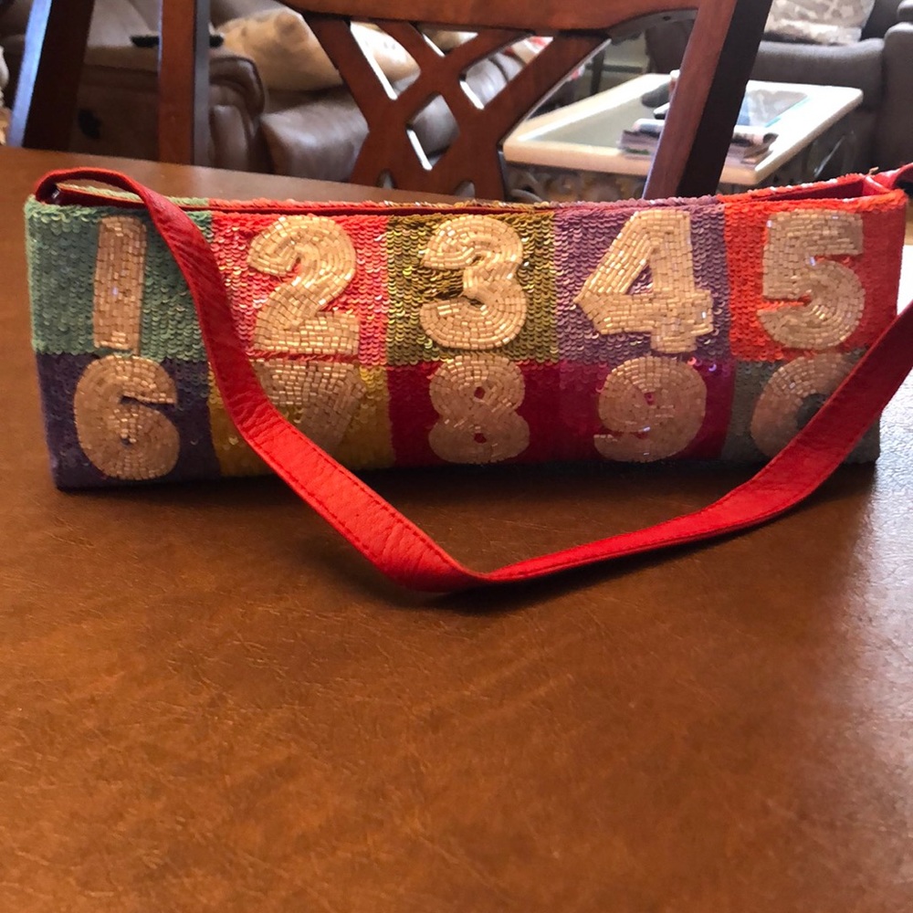 Boutique specialty sequined handbag clutch.